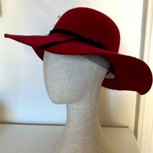 Red felt hat. With black glitter band and tie